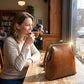 Sac bandoulière femme à fermoir kiss lock avec poignée supérieure