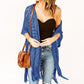 🌸🦋🌼 OFFRE LIMITÉE 50% DE RÉDUCTION! Poncho/Pareo Bohème en Maille Ajourée pour Femme – Ouverture Devant avec Pompons et Franges, Tissu Léger, Idéal pour les Jours Ensoleillés, les Vacances et le Quotidien Chic ✨🎶