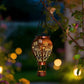 🎈🌙OFFRE LIMITÉE 50% DE RÉDUCTION! Lanterne Montgolfière Solaire – Lumière Suspendue pour Jardin, Terrasse ou Cour, S’allume Automatique au Crépuscule, Lueur Flottante Magique – Parfaite pour les Soirées & Fêtes 🏮🌸