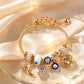 Bracelet à breloques célestes soleil et lune